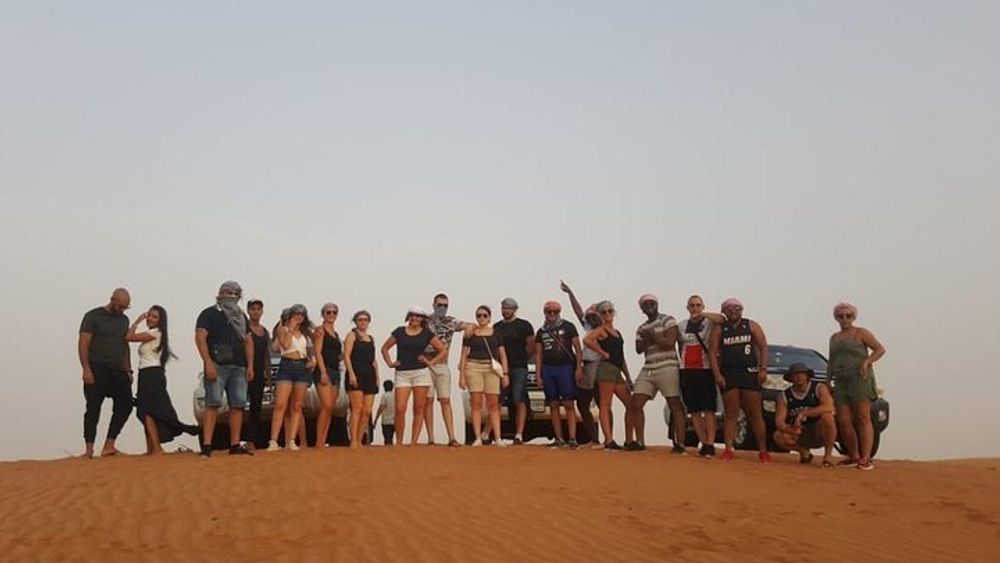 4 Hours Evening Desert Safari Camel Ride Sand Boarding