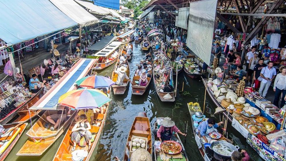 Visit Damneon Saduak Floating Market & Erawan Waterfall