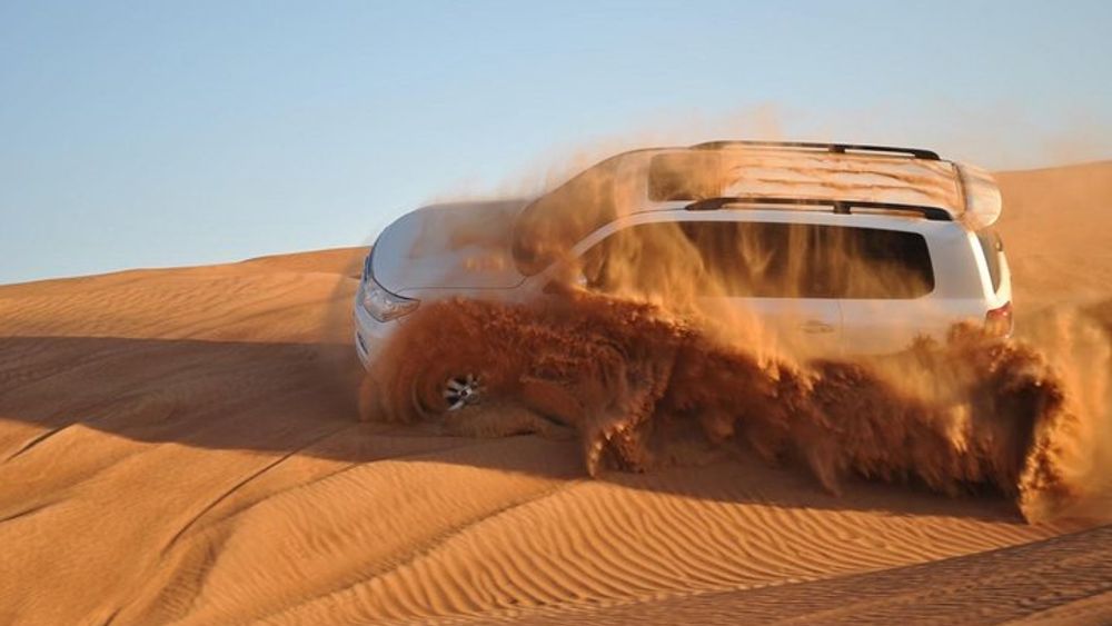 4X4 Dubai Desert Safari with BBQ dinner, Camels & Live Show