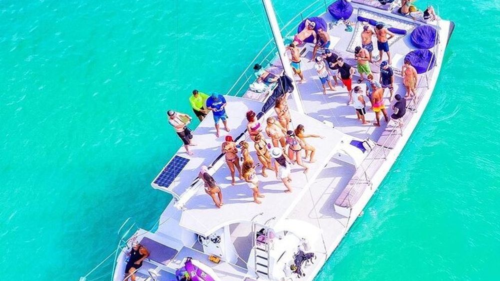 Catamaran Cruise with Snorkeling & Parasailing