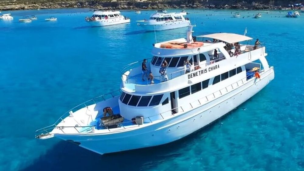 Blue Lagoon Boat Tour with Wine Tasting and Barbecue