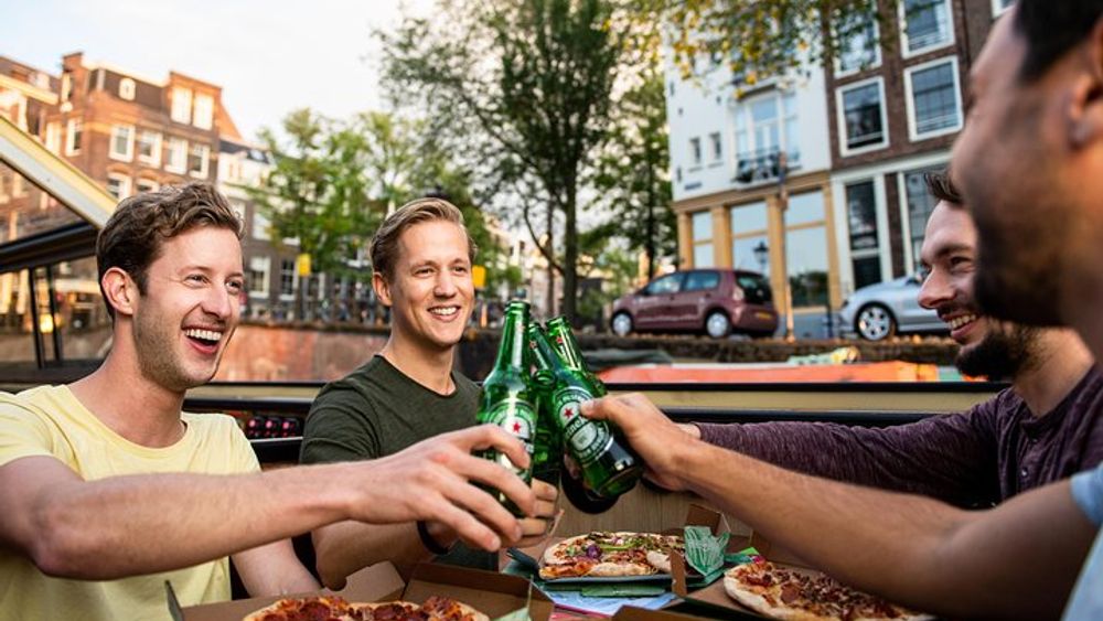 Amsterdam Evening Canal Cruise Including Pizza and Drinks