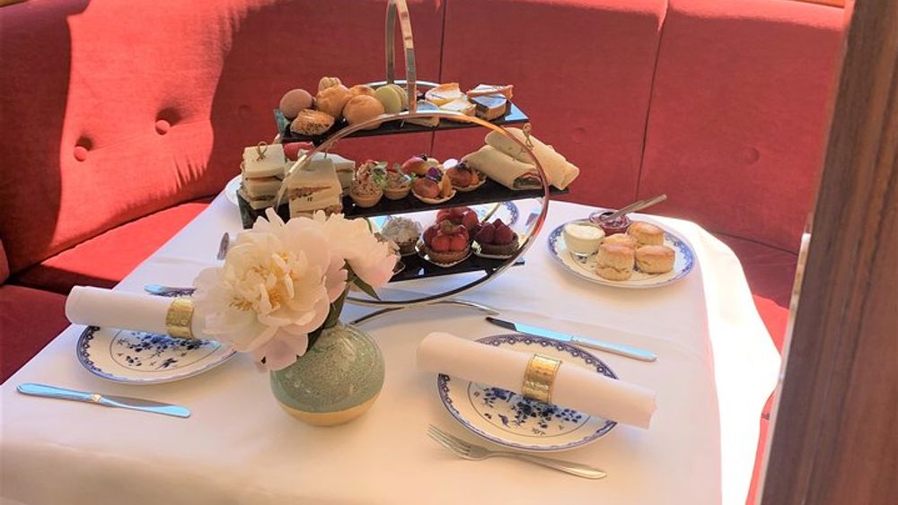 Cruise through the Amsterdam canals with high tea and Wi-Fi on board