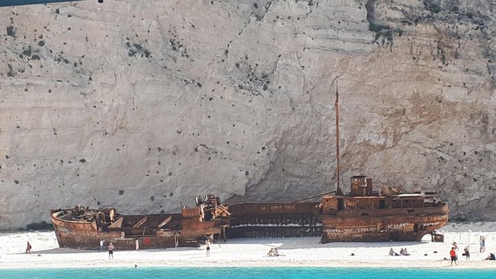 Glass-Bottom Boat Cruise to Shipwreck Beach and the Blue Caves