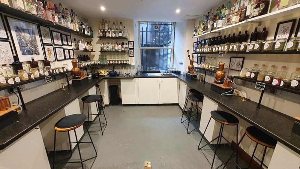 Distill a bottle of gin on mini copper stills