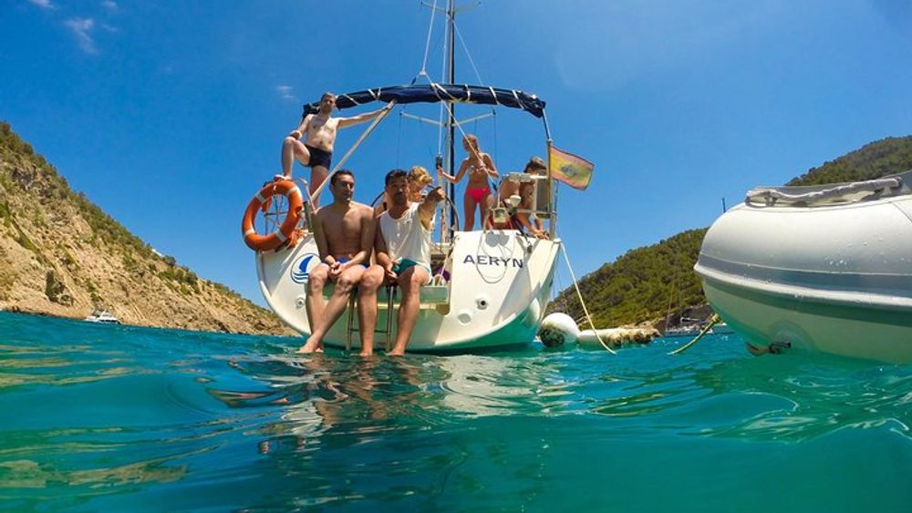 Small-Group Sail Trip in Barcelona with Paddle Boarding